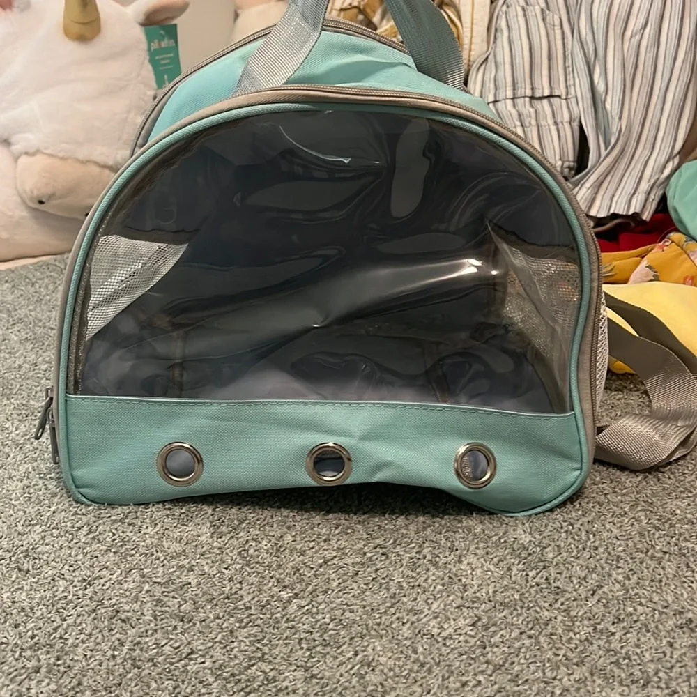 small pet animal carrier, small hole, blue